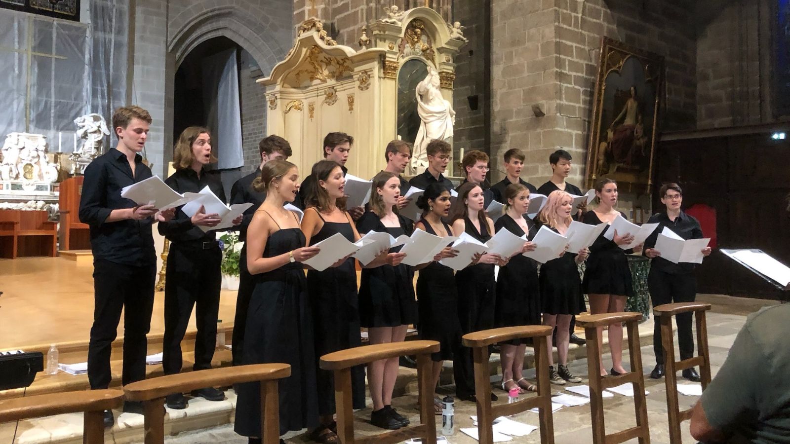 Photo of the LMH Choir performing in a church in France