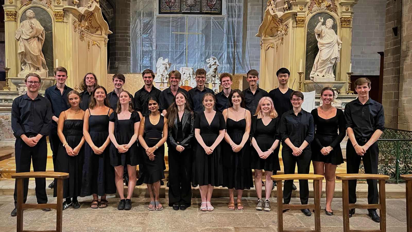 A photo of the LMH Choir performing in a church in France