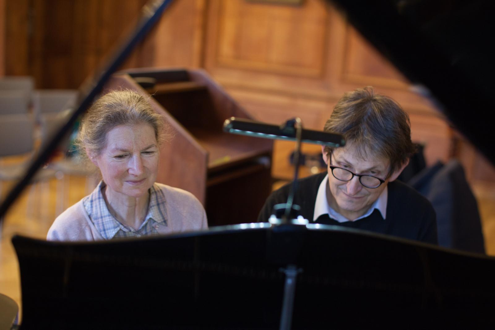 Susan Wollenberg plays the piano with Principal Alan Rusbridger