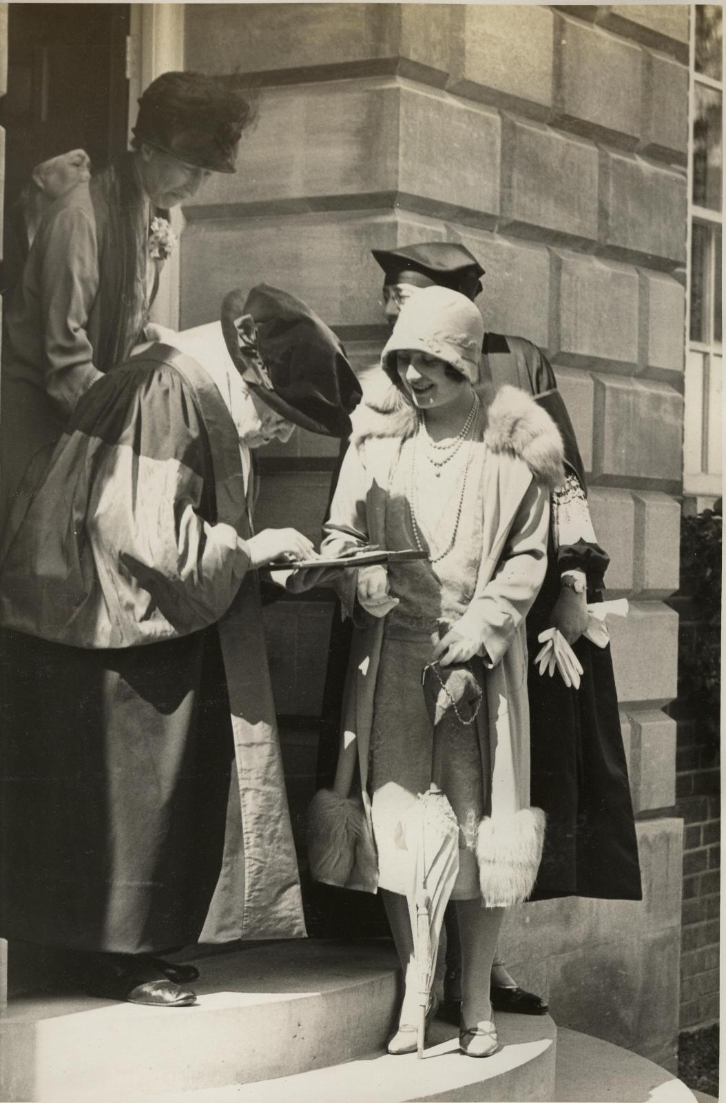 1928, Dutchess of York presents Elizabeth Wordsworth, Principal of LMH, the insignia DBE