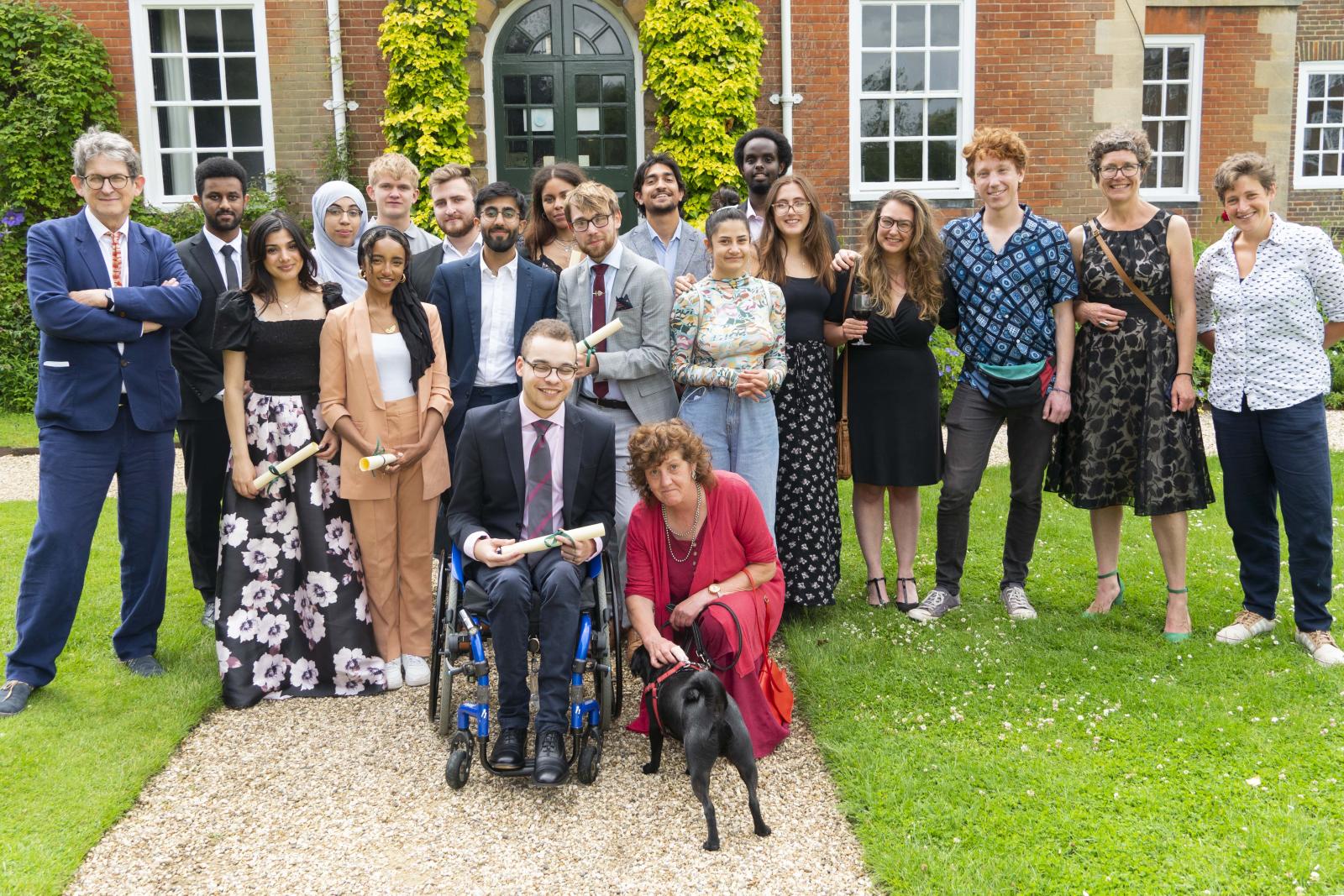 LMH Foundation Year students and staff celebrating graduation in the LMH Gardens