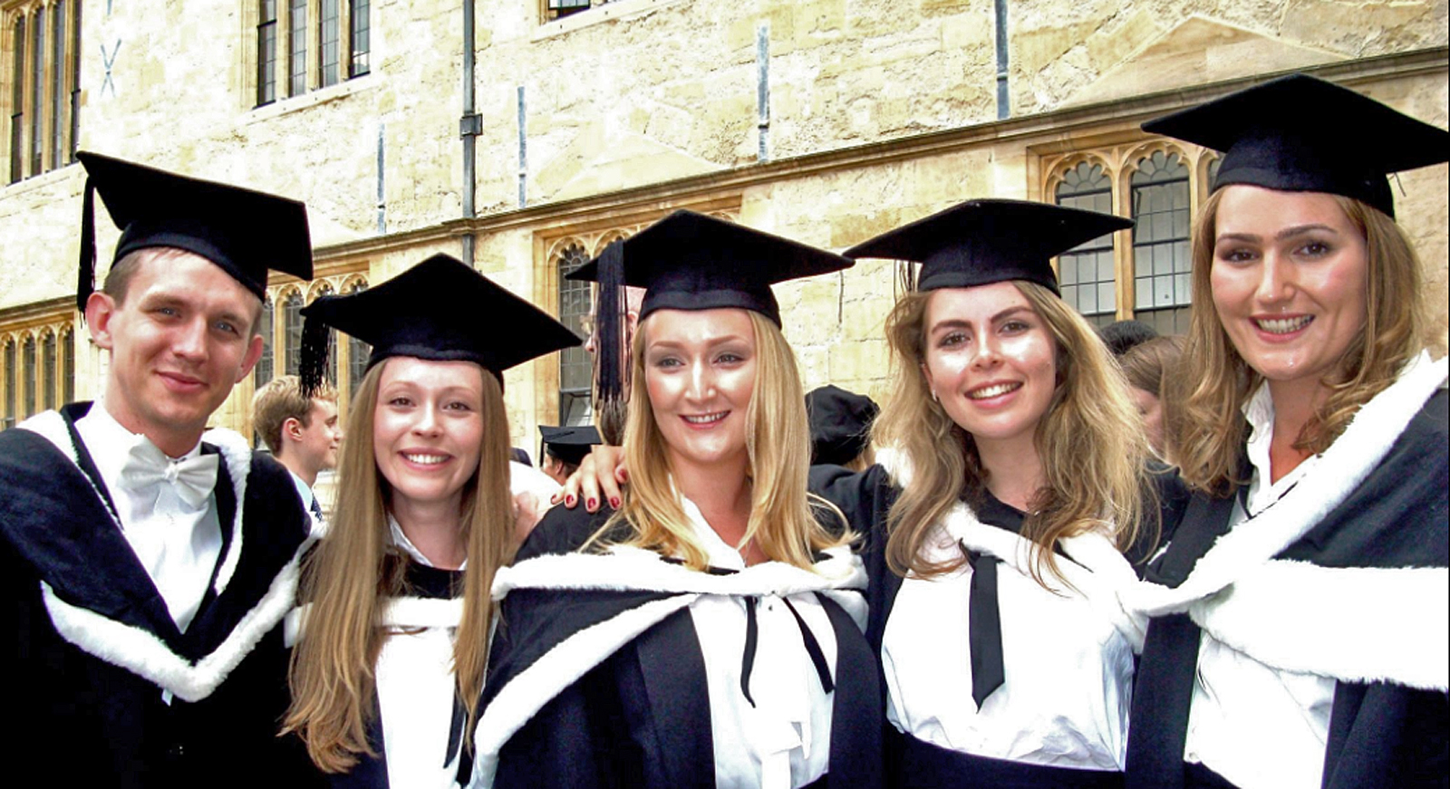 Paul McClean graduating with his French class