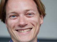 Close up portrait of Tom Littler