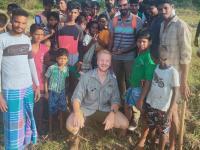 Photo of Harrison Carter and a group of local people in Tamil Nadu, India