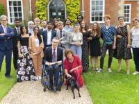 LMH Foundation Year students and staff celebrating graduation in the LMH Gardens