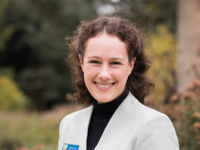 Elizabeth Rivers Tan standing in the LMH gardens