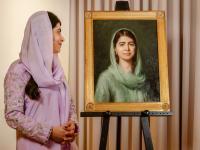 Malala stood alongside her portrait 