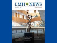 The cover of the 2025 edition of LMH News magazine, which has a white background with blue writing and a striking image of a geometric metal sculpture standing in a modern atrium with wood panneling