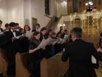 A group of student choir members performing in the LMH chapel