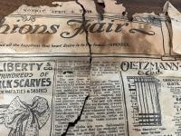 An old newspaper from April 1910 - it is discoloured and frayed around the edges