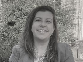 Black and white photo of Dr Vania Pinto