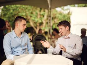 Two people chatting