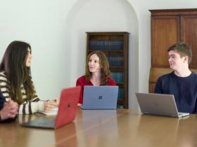 Students sitting in a tutorial with their tutor