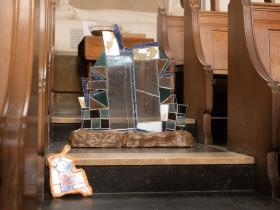 Sculptures on the floor of the chapel made out of glass and ceramics
