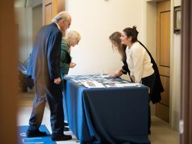 Members of LMH staff welcoming alumni back to College