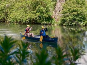 Two students in a canadian canoe racing