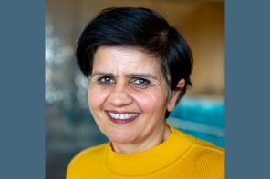 Prof Monima Chadha, who has short dark hair and is wearing a yellow top