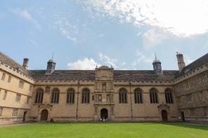 A sandstone building at Wadham College, standing in a traditional quadrangle with grass in the centre