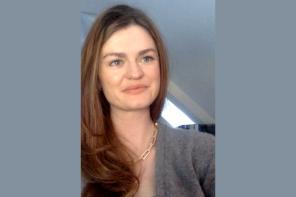 Dr Felicity Brown, who has long brown hair and is wearing a grey jumper