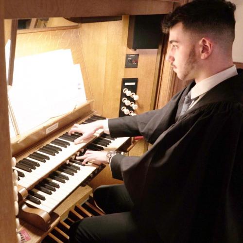 LMH Organ Scholar Jim Bate playing the LMH Chapel organ.