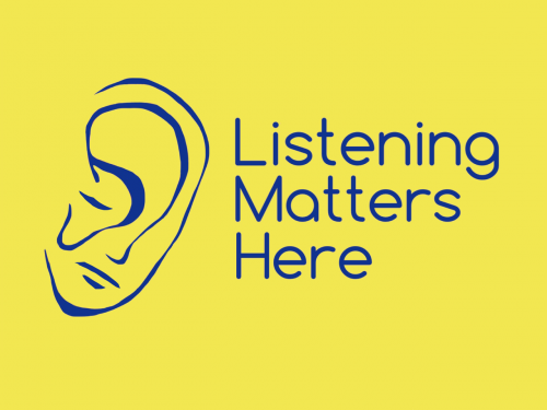 Listening Matters Here logo - yellow background, blue font, with a drawing of an ear next to text