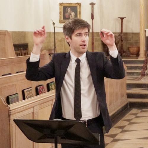 LMH Director of Chapel Music Paul Burke composing the LMH choir in the Chapel