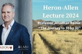 Photo of Professor Jonathan Baillie wearing a blue suit alongside an image of rugged countryside and mountains