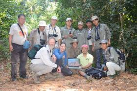 A photo of a group of people on a field trip in the jungle