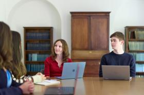 A tutorial being held, with one tutor and three students
