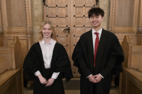 Scarlett Jenkins and George Ke standing in the LMH Chapel