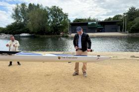 James Lindsay stood next to the Faraday on the river bank