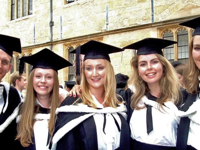 Paul McClean graduating with his French class