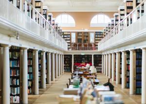 LMH's gallery style Library, which has shelves of books along each side and a wrap-around balcony