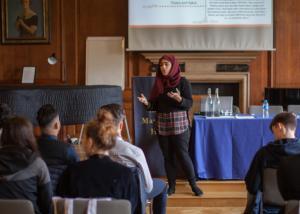 Marrium Khan speaking to a room full of potential students