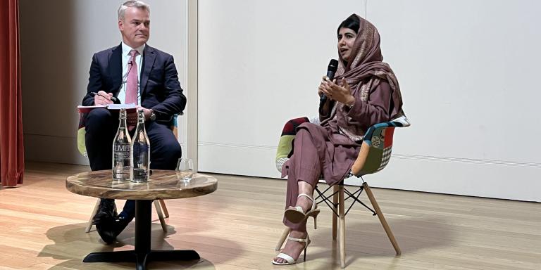 Malala Yousafzai sitting next to Professor Stephen Blyth