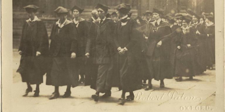 In 1920 women finally became full members of the University. This photograph, taken from the unpublished memoir of Helena Deneke ( LMH Tutor of German 1913-1938), shows students walking to the Sheldonian Theatre before being  presented their degrees.