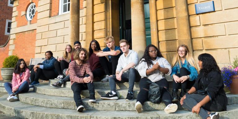 Foundation Year second cohort sitting on Talbot Hall steps