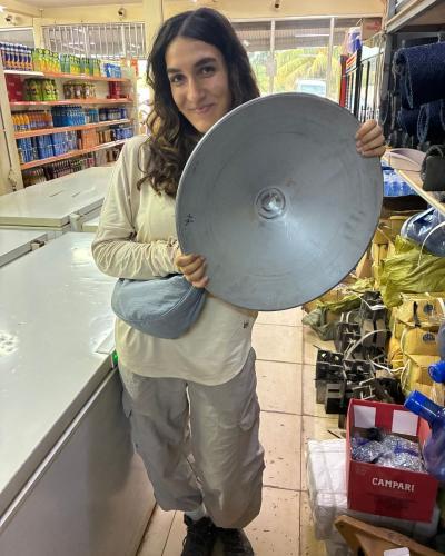 Hela holding a gold dish