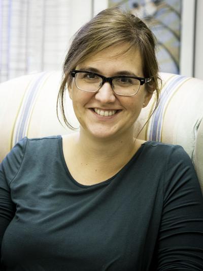 Picture of Sanja sitting in an armchair