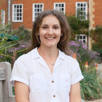 Hannie Lawlor sitting on a bench in the LMH grounds