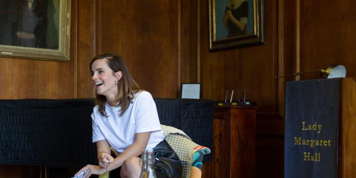 Photograph of Emma Watson smiling in chair at LMH. Taken May 2019 by Amaal Said