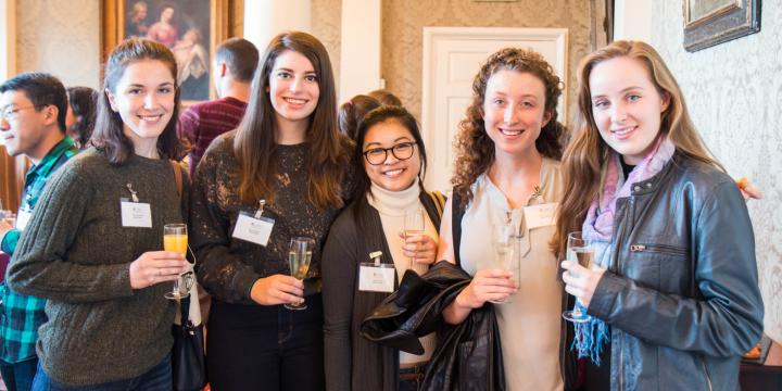 Group of Visiting Students having a drink in the Old Library