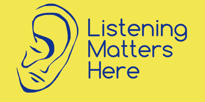 Listening Matters Here logo - yellow background, blue font, with a drawing of an ear next to text