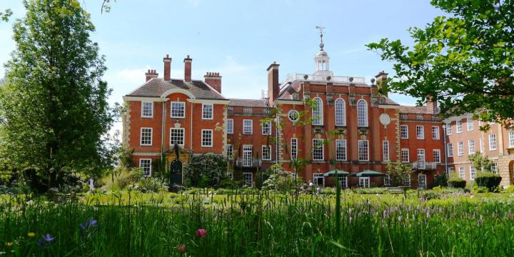 A view of Talbot Hall through the LMH gardens.